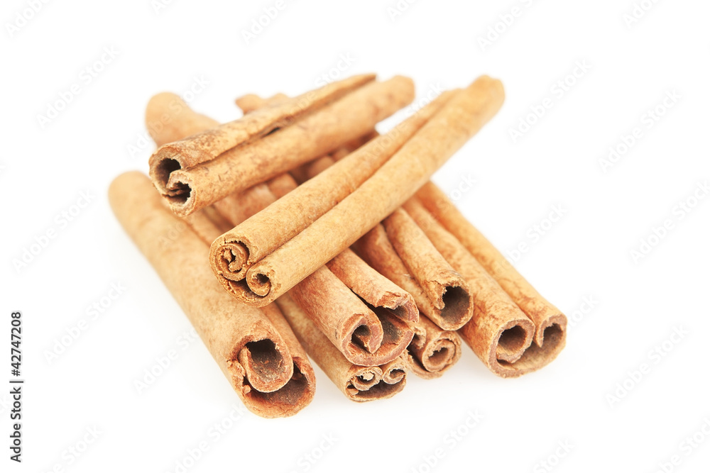 A set of cinnamon, canella sticks on a white background.