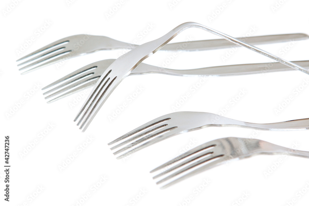 A set of forks in the conceptual solution. On a white background A set of forks in the conceptual solution. On a white background