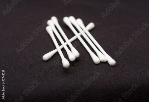 Cotton sticks isolated on black background