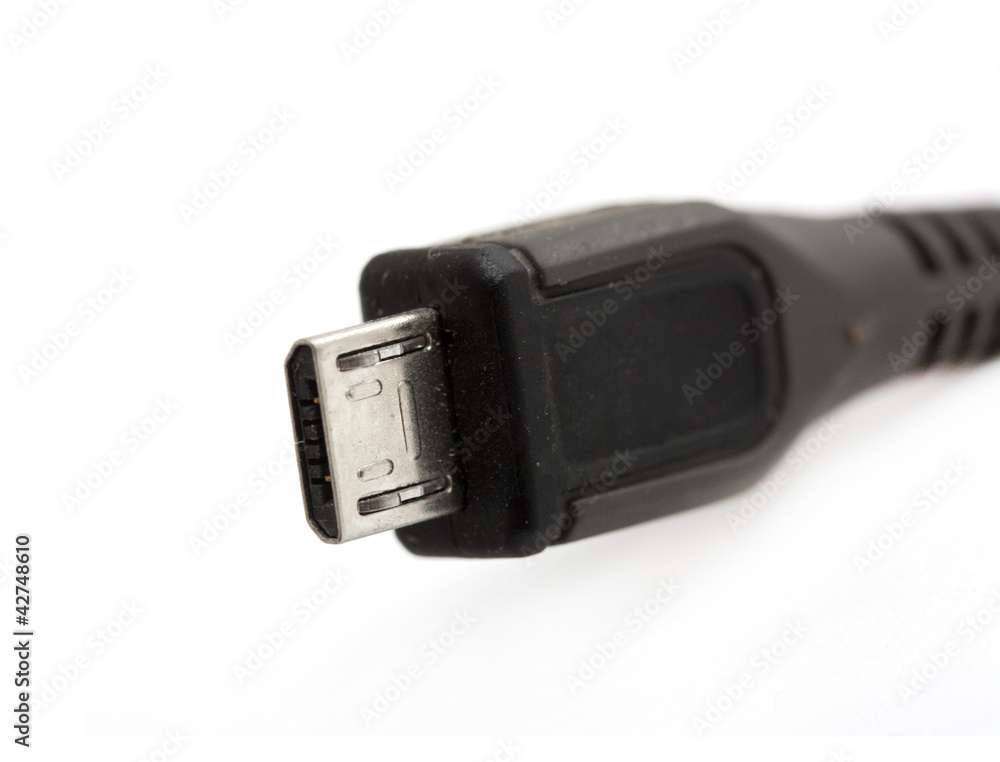 USB cable on the white isolate background USB cable on the white isolate background
