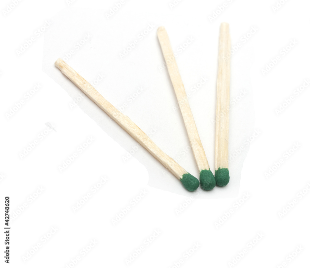 three green match on a white background three green match on a white background
