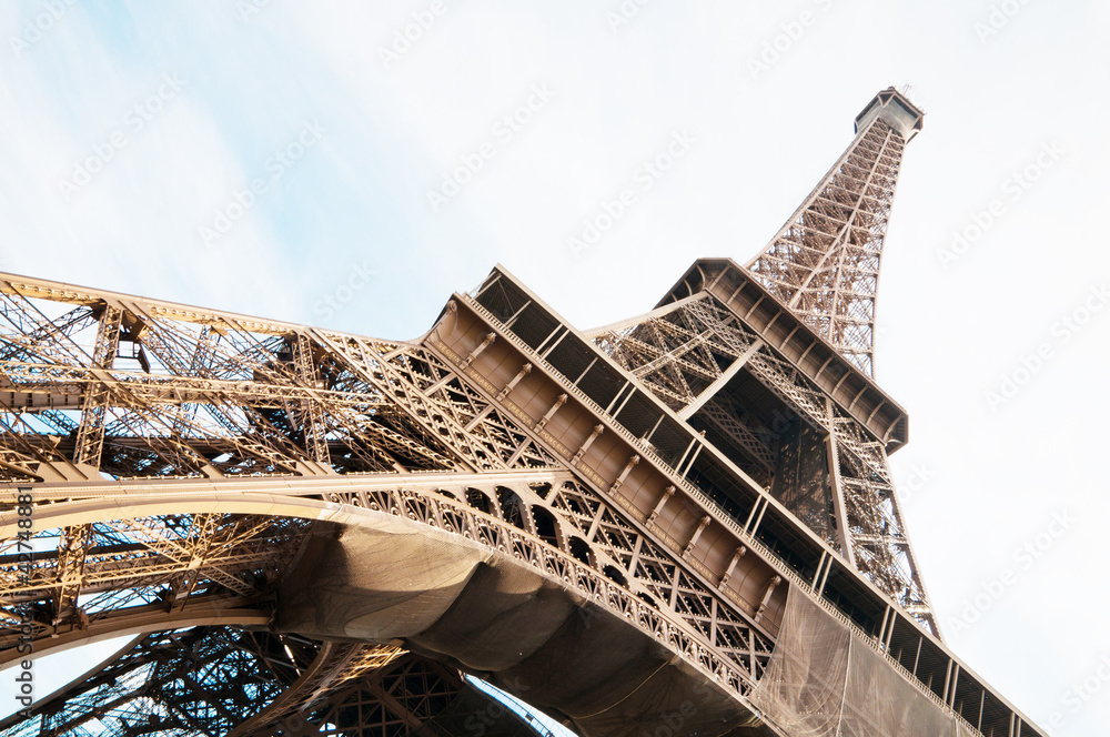 Vertical oriented image famous Eiffel Tower in Paris, France.