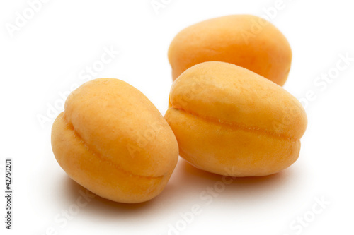 Three ripe apricots