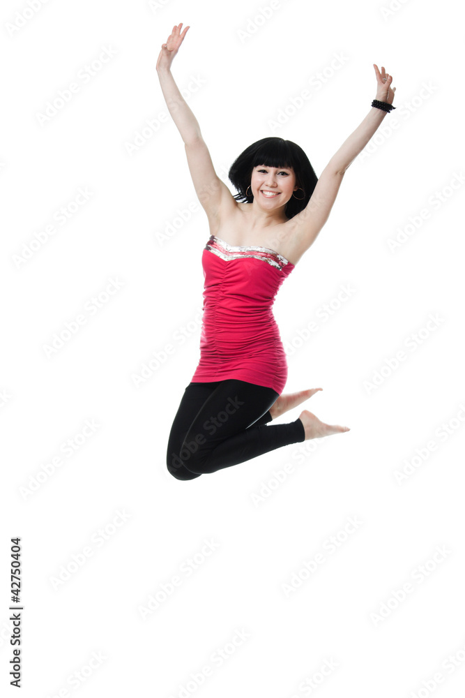 Young woman jumping high into the air