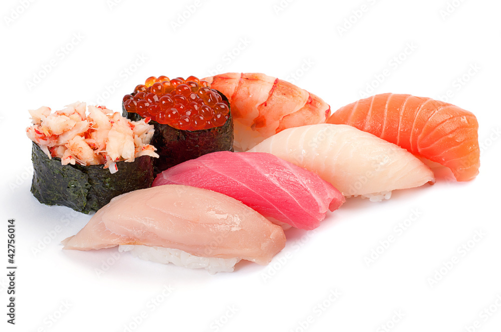 Assorted Sushi small. On a white background. Salmon, tuna, yello Assorted Sushi small. On a white background. Salmon, tuna, yello