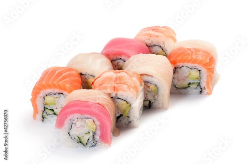Uramaki. Rainbow. Salmon, tuna, grouper, yellowtail, tiger prawn