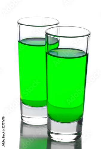 Two glasses of absinthe isolated on white