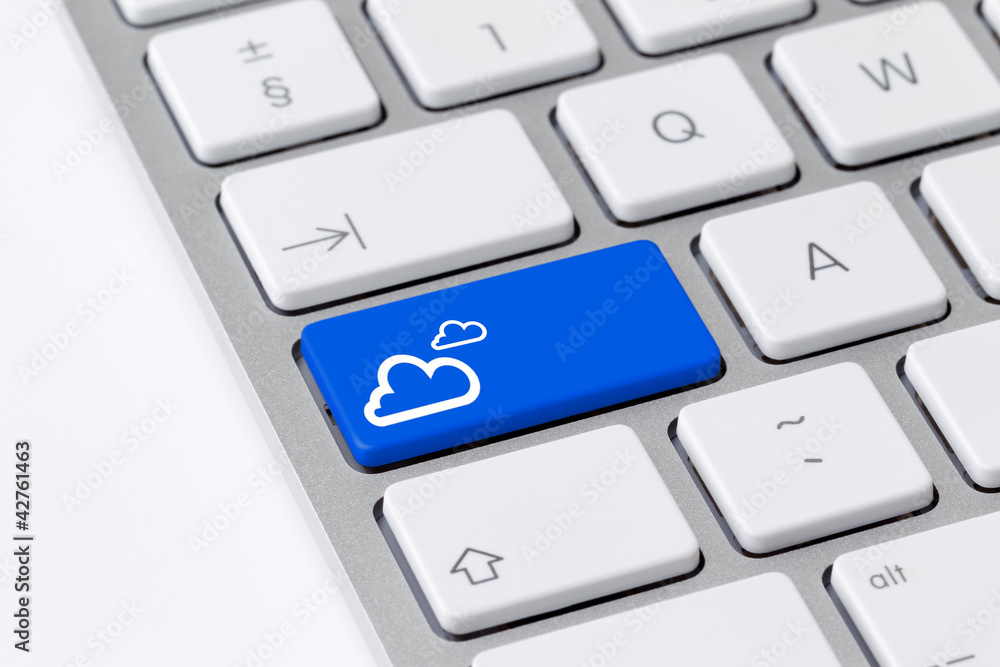 Keyboard with blue button showing cloud computing icon