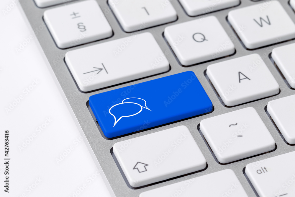 Keyboard with a single blue button showing the chat icon Keyboard with a single blue button showing the chat icon