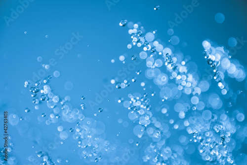 Falling water drops background © elovich