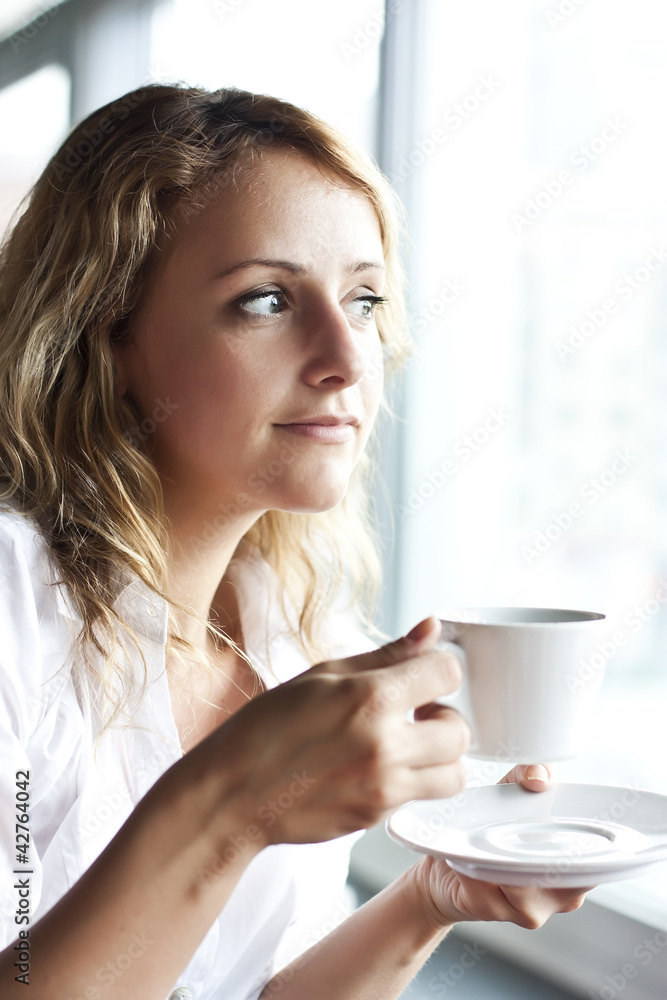 Beautiful woman in street cafe ,with cup Beautiful woman in street cafe ,with cup