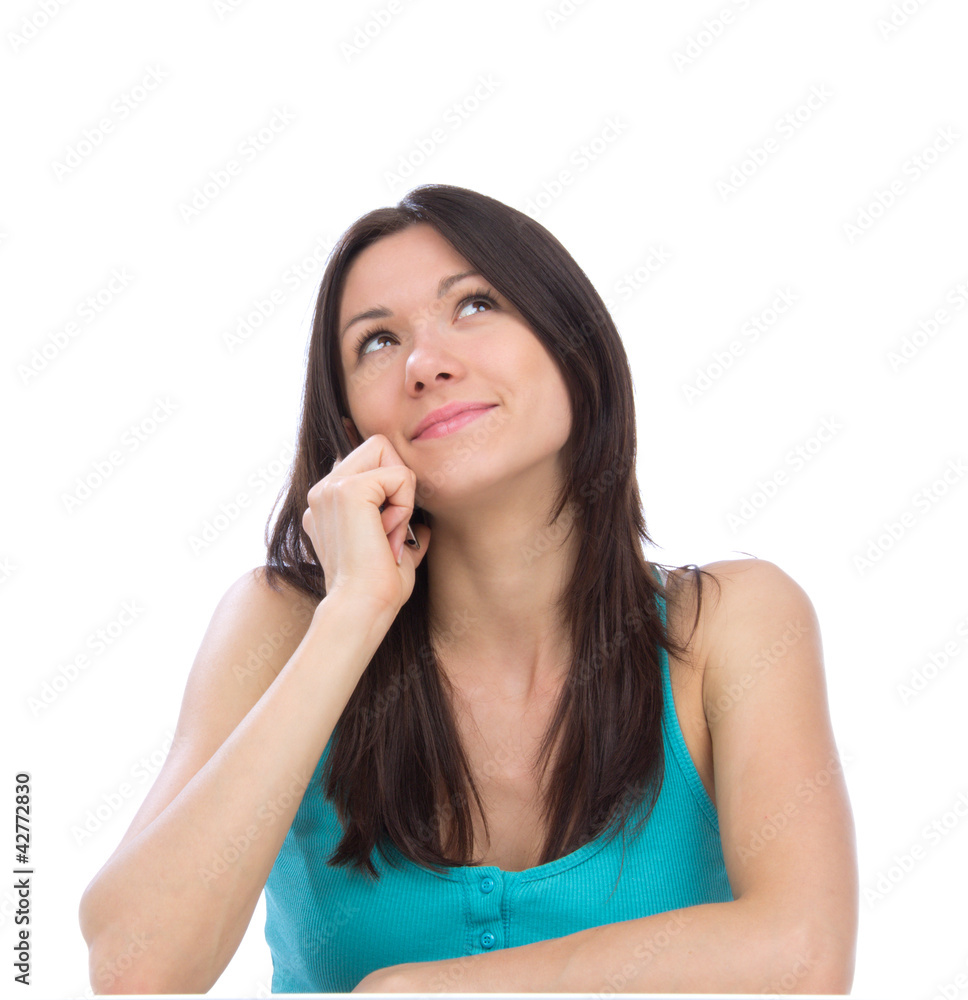 woman talking on the phone, smiling and looking up in office woman talking on the phone, smiling and looking up in office