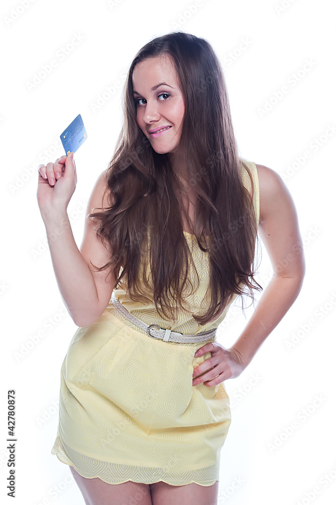 Young and beautiful girl with a credit card in the hands of blue Young and beautiful girl with a credit card in the hands of blue