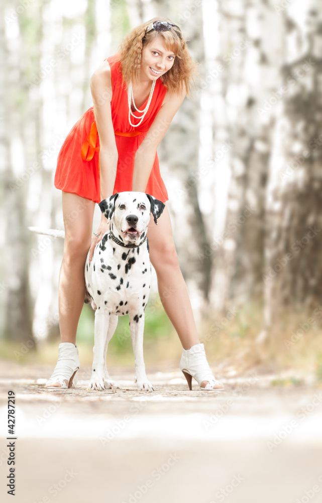 Sexy young woman with dog.