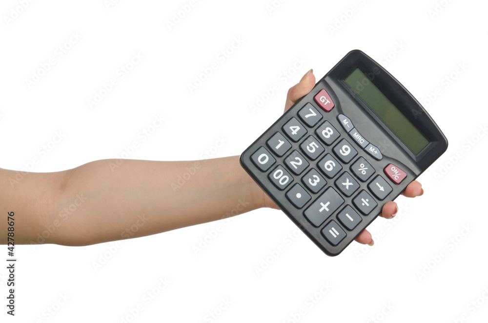 Hand holding calculator on white