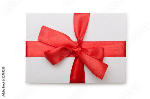 Envelope with colourful ribbon on white © Elnur