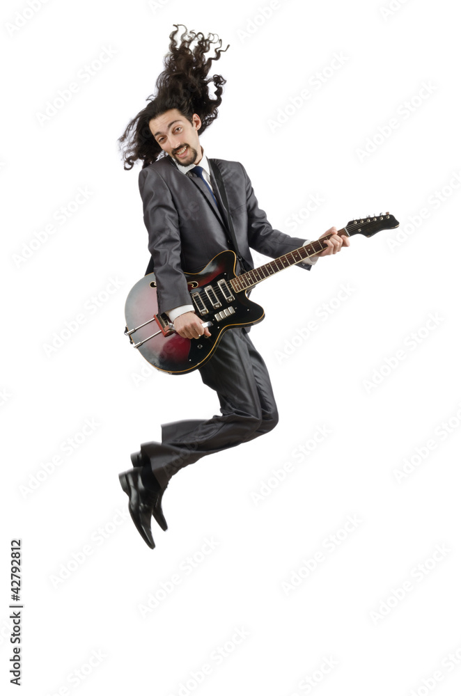 Guitar player in business suit on white Guitar player in business suit on white
