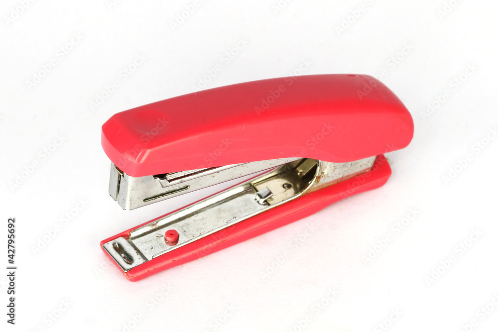 Red stapler isolated on a white background Red stapler isolated on a white background