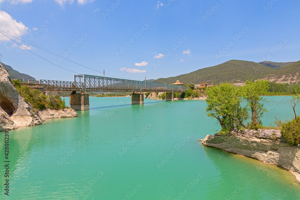 steel bridge over reservoir