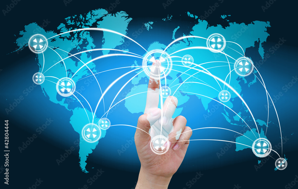 hand pushing social network on world map hand pushing social network on world map