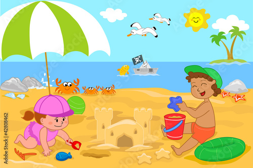 Due bambini che giocano in spiaggia con la sabbia