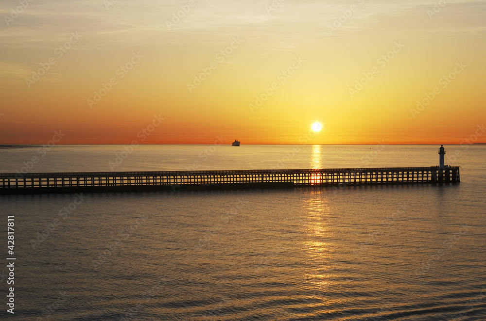 Fototapeta premium Sunset over sea at Calais. France