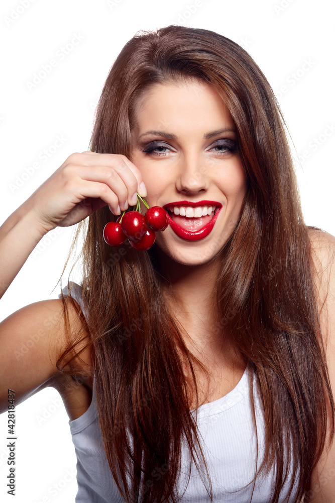 Happy health woman with cherry isolated on white background Happy health woman with cherry isolated on white background