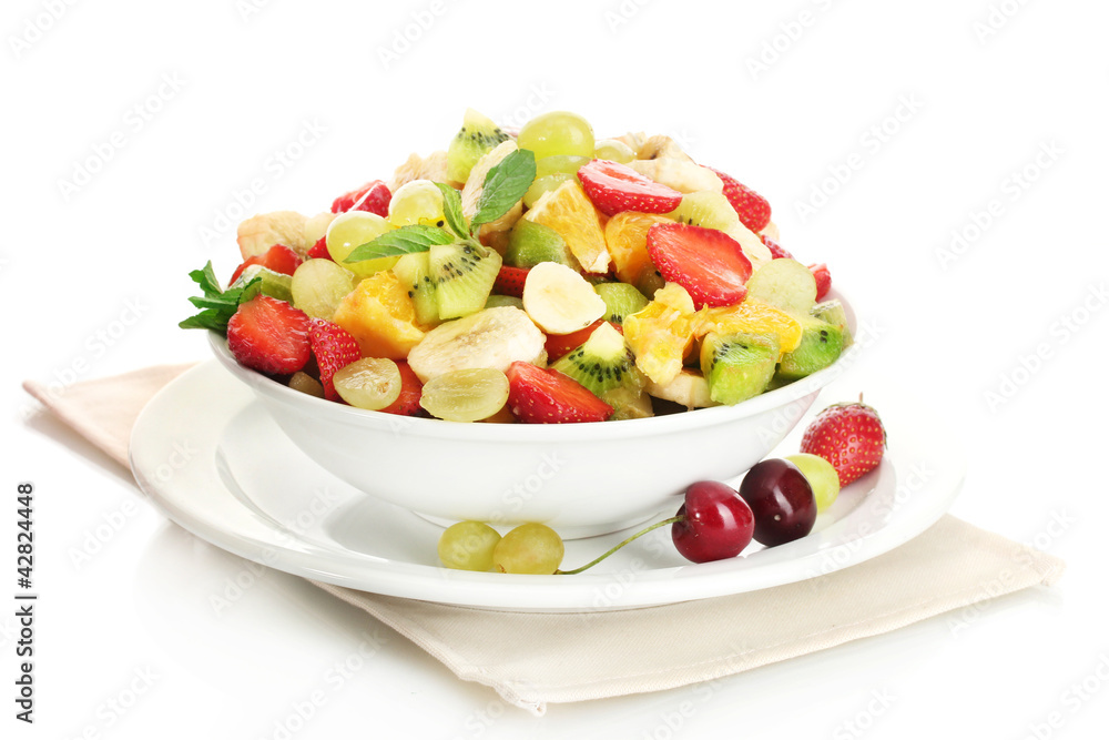 bowl with fresh fruits salad and berries isolated on white bowl with fresh fruits salad and berries isolated on white