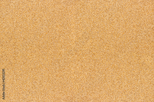 Fond de sable couleur orangé vu de dessus