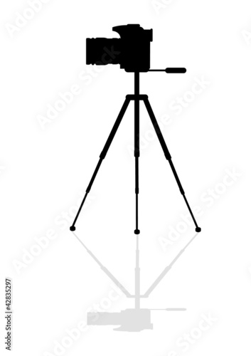 Silhouette SLR camera on a tripod
