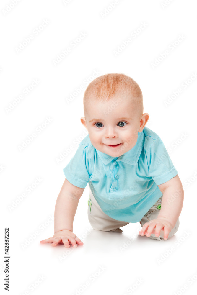 Smiling baby crawling forward