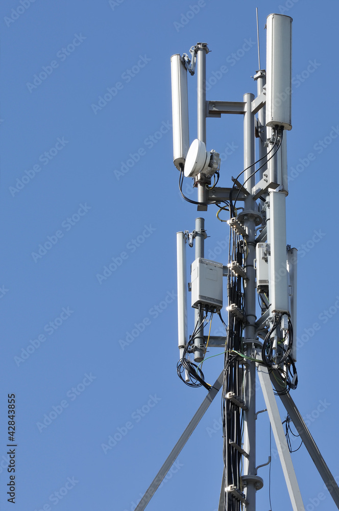 Cell Phone Tower against Blue Sky Cell Phone Tower against Blue Sky