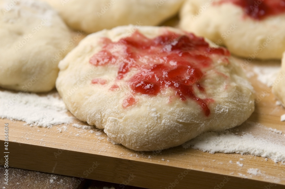 Sweet doughnuts with rose marmelade