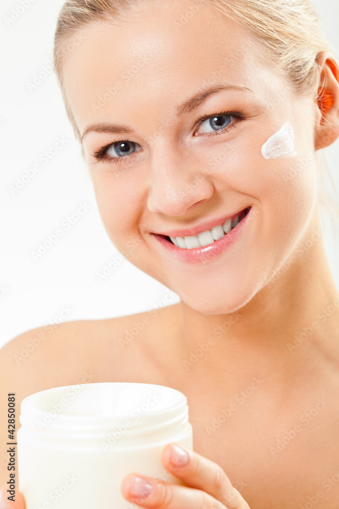 closeup blond woman portrait with cream closeup blond woman portrait with cream
