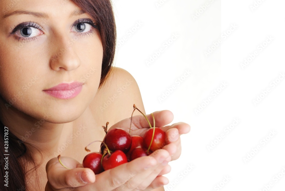 Beautiful brunette with cherry fruit on white background Beautiful brunette with cherry fruit on white background