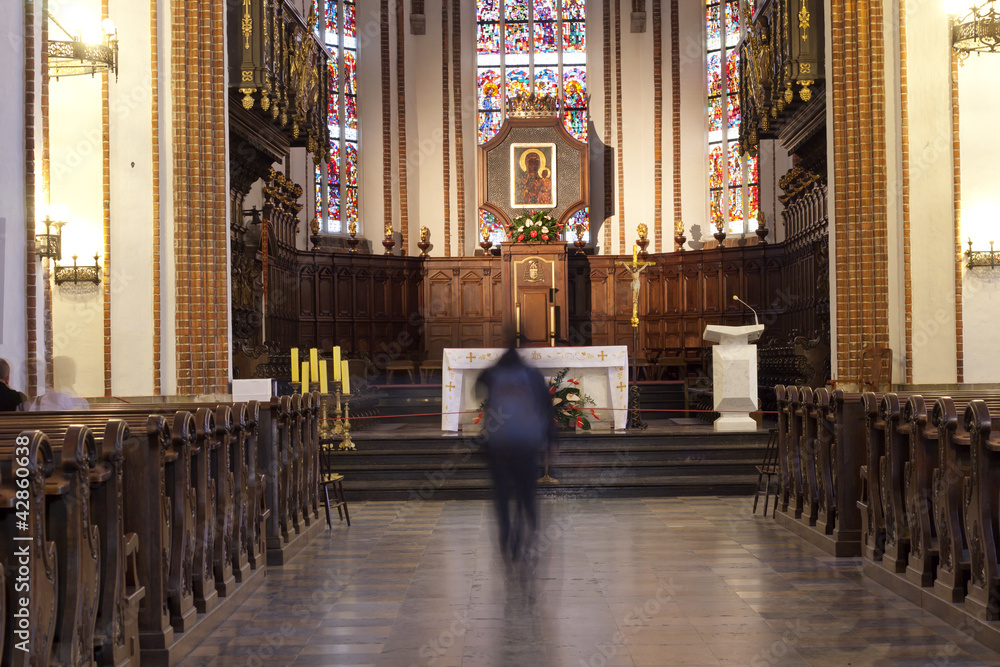 Fototapeta premium Church inside and prayer St. John's Cathedral, Warsaw