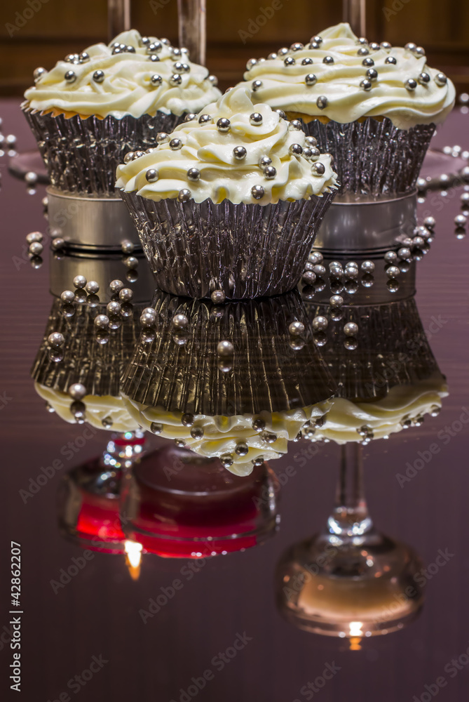 White Cupcakes with Silver Decoration