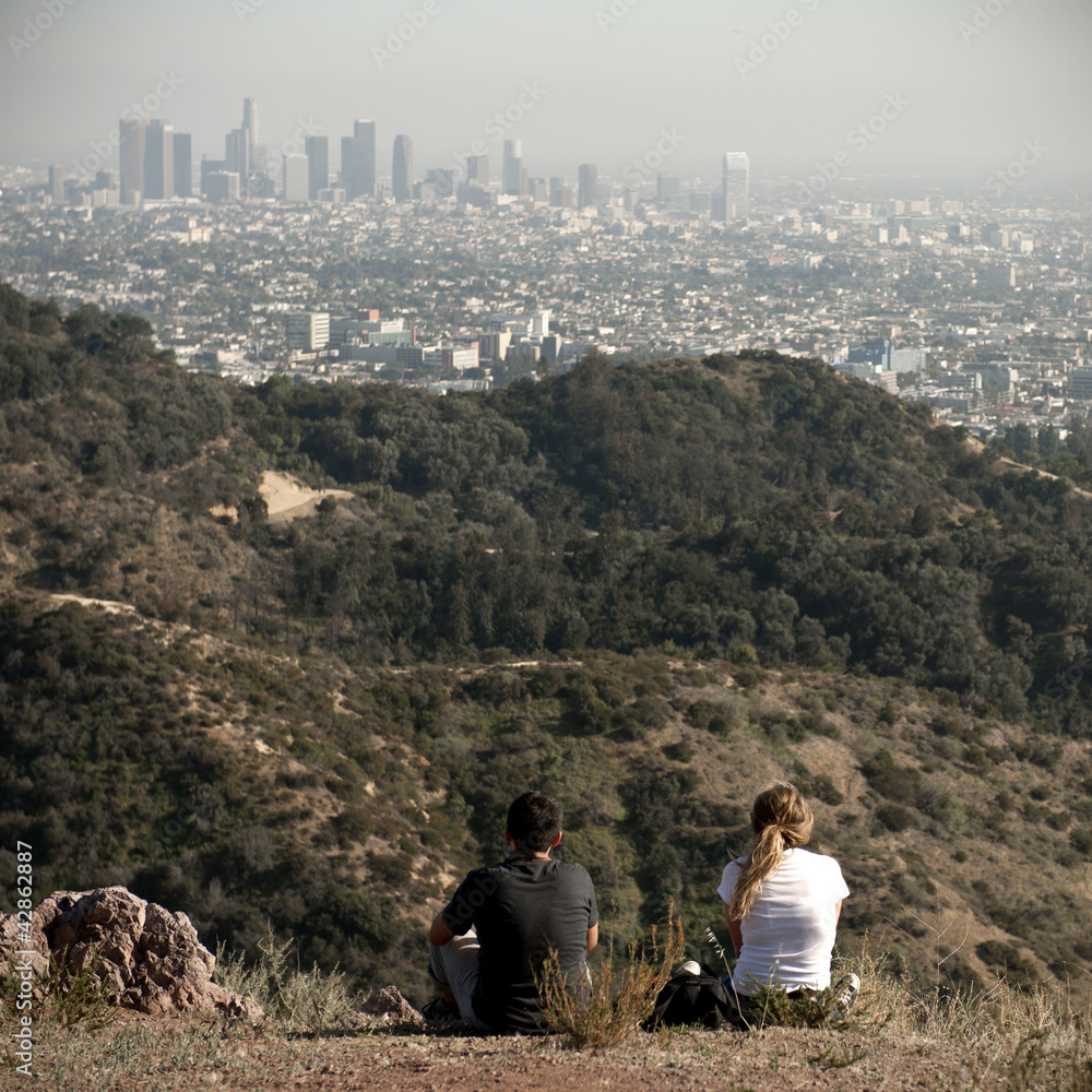 Two people looking at Los Angeles, California, USA