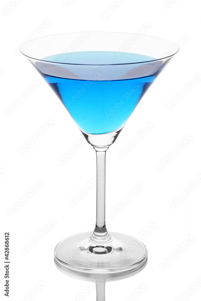 Blue cocktail in martini glass isolated on white