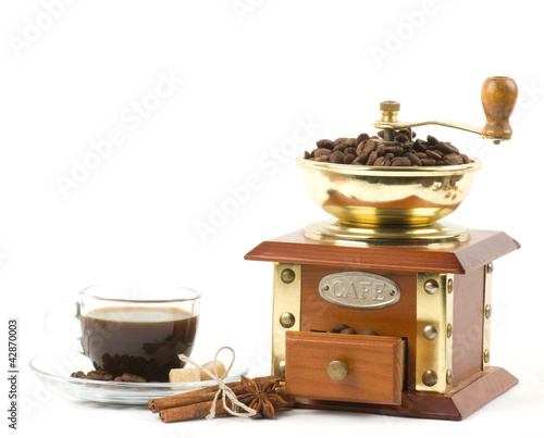 Coffee grinder and little coffee cup