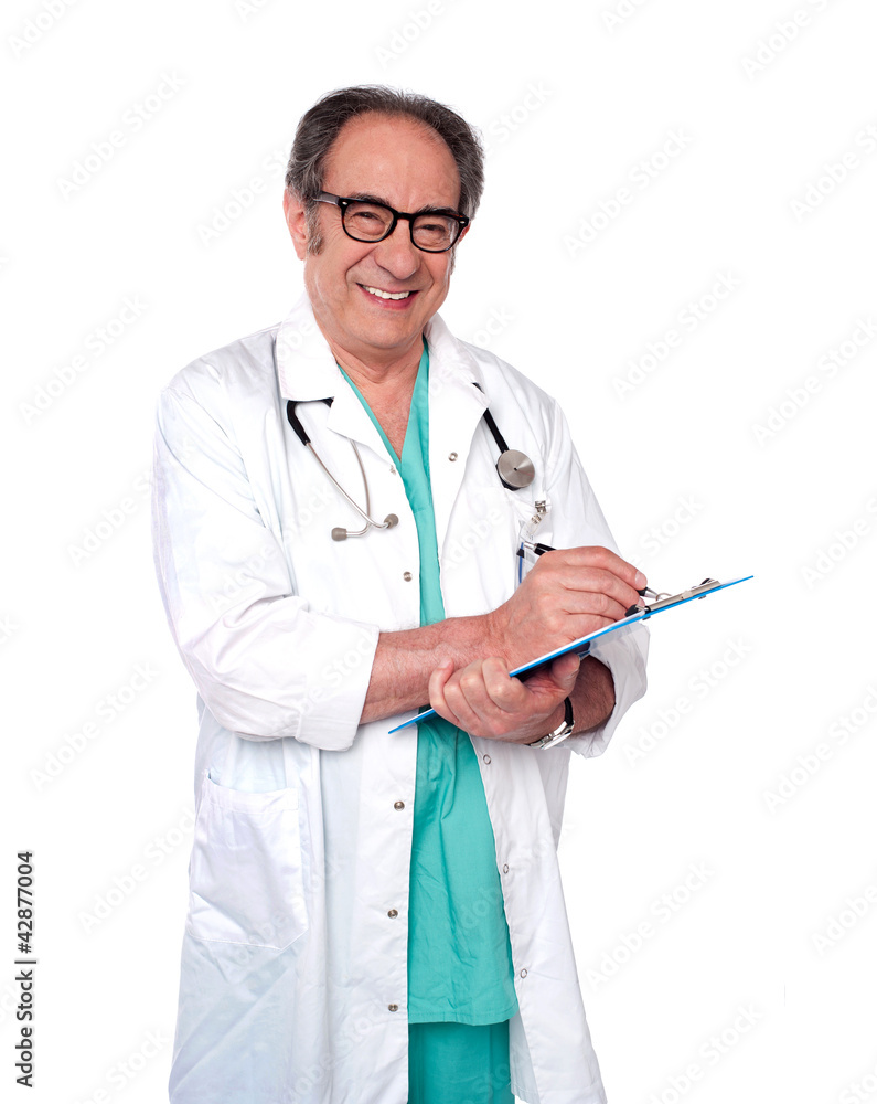 Friendly male doctor with a clipboard Friendly male doctor with a clipboard