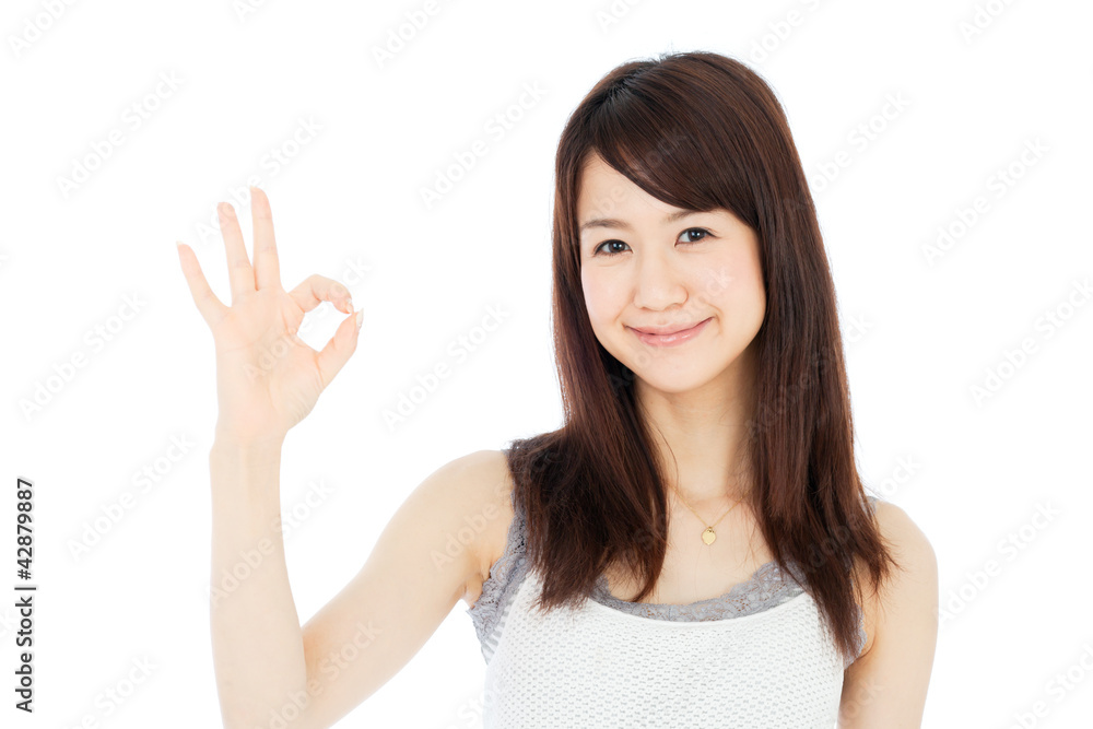Beautiful young woman showing ok sign. Portrait of asian. Beautiful young woman showing ok sign. Portrait of asian.