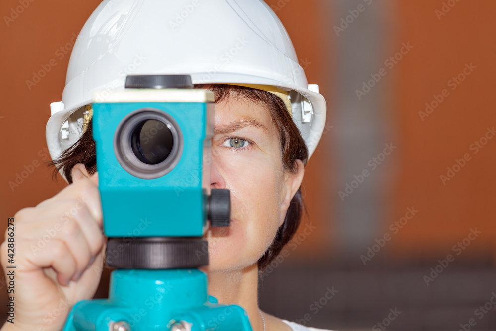 Civil engineer with leveling Civil engineer with leveling