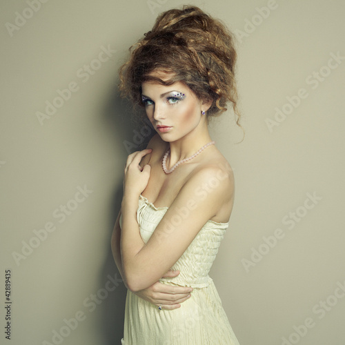 Portrait of beautiful  woman with elegant hairstyle