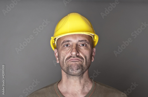 Unhappy, sceptical worker