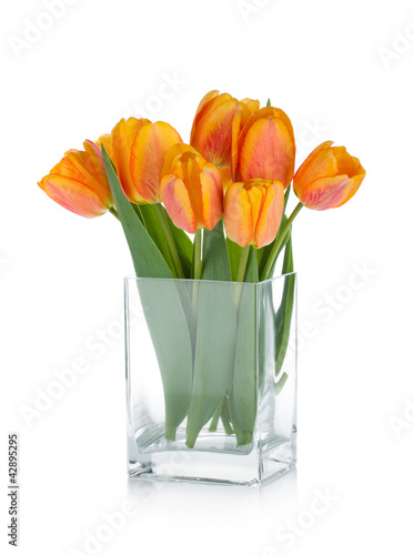 Fototapeta Naklejka Na Ścianę i Meble -  Orange tulips in flower bowl