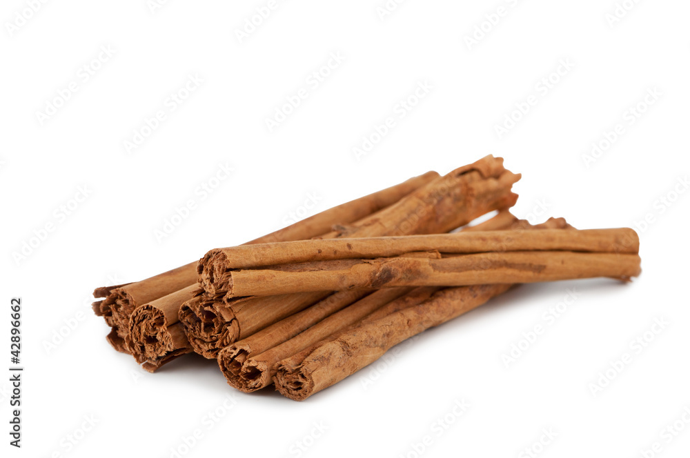 Cinnamon sticks on a white background. Cinnamon sticks on a white background.