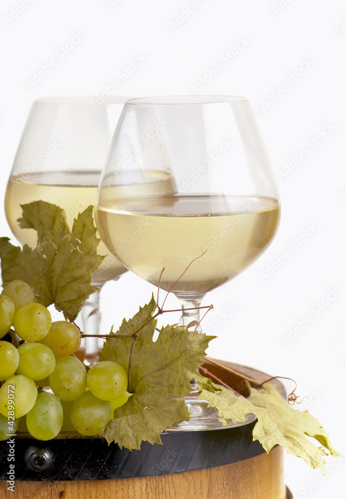White wine in fine glass and grape