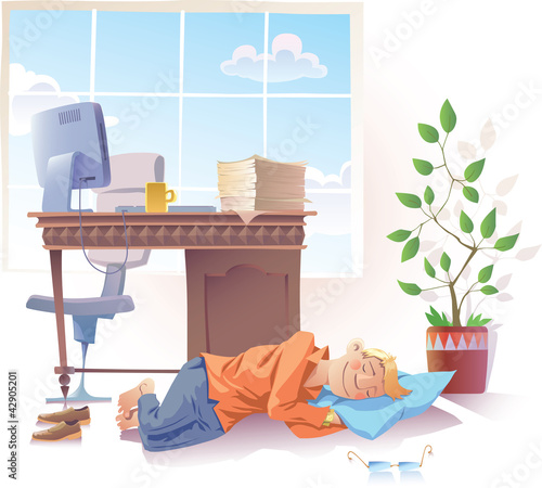 The young man is sleeping sweet at the office.