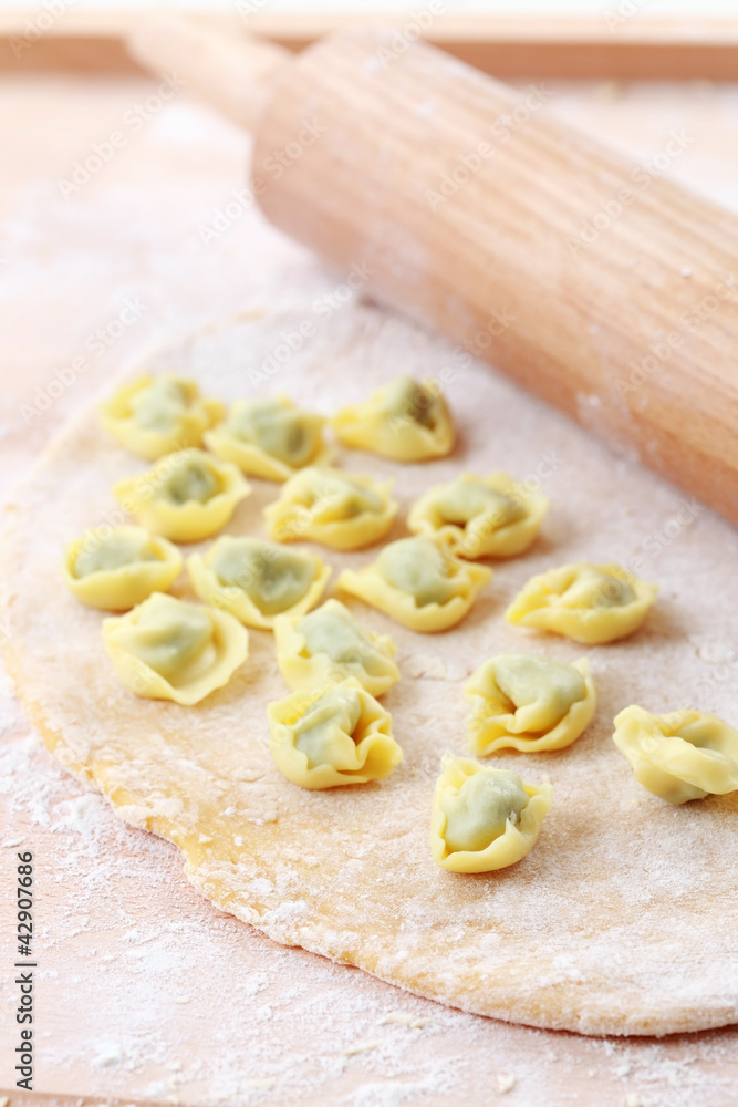 Dough with raw tortellini Dough with raw tortellini